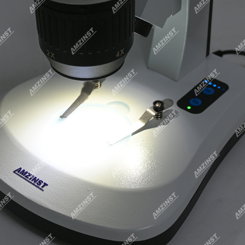 Бинокулярный стереомикроскоп AHT-33 с поворотным объективом (2x-4x) и сенсорной регулировкой яркости, светодиодами проходящего и падающего света и аккумуляторными батареями Бинокулярный стереомикроскоп AHT-33 с поворотным объективом (2x-4x) и сенсорной регулировкой яркости, светодиодами проходящего и падающего света и аккумуляторными батареями