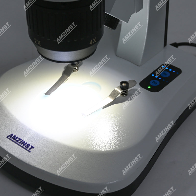 Бинокулярный стереомикроскоп AHT-33 с поворотным объективом (2x-4x) и сенсорной регулировкой яркости, светодиодами проходящего и падающего света и аккумуляторными батареями Бинокулярный стереомикроскоп AHT-33 с поворотным объективом (2x-4x) и сенсорной регулировкой яркости, светодиодами проходящего и падающего света и аккумуляторными батареями