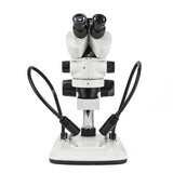 Стереомикроскоп NZM0745T-D9 с увеличением 0,7X-4,5X и двойным осветителем Стереомикроскоп NZM0745T-D9 с увеличением 0,7X-4,5X и двойным осветителем