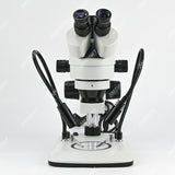 ZM0745T-D9 Стереомикроскоп с увеличением 0,7X-4,5X и источником света на двух гибких стойках ZM0745T-D9 Стереомикроскоп с увеличением 0,7X-4,5X и источником света на двух гибких стойках