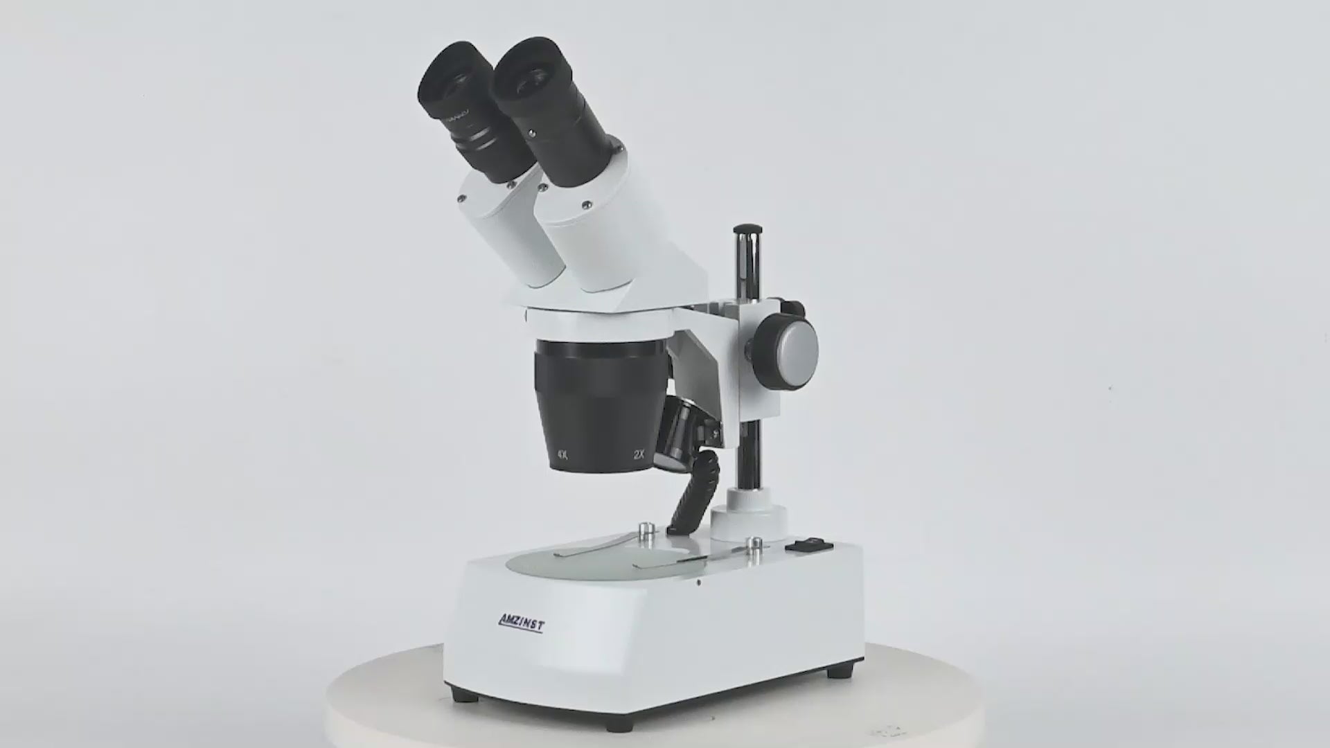 Бинокулярный стереомикроскоп AST-5C Classic с поворотным объективом (2x-4x), штативом и светодиодным проходящим и падающим освещением.  Бинокулярный стереомикроскоп AST-5C Classic с поворотным объективом (2x-4x), штативом и светодиодным проходящим и падающим освещением.