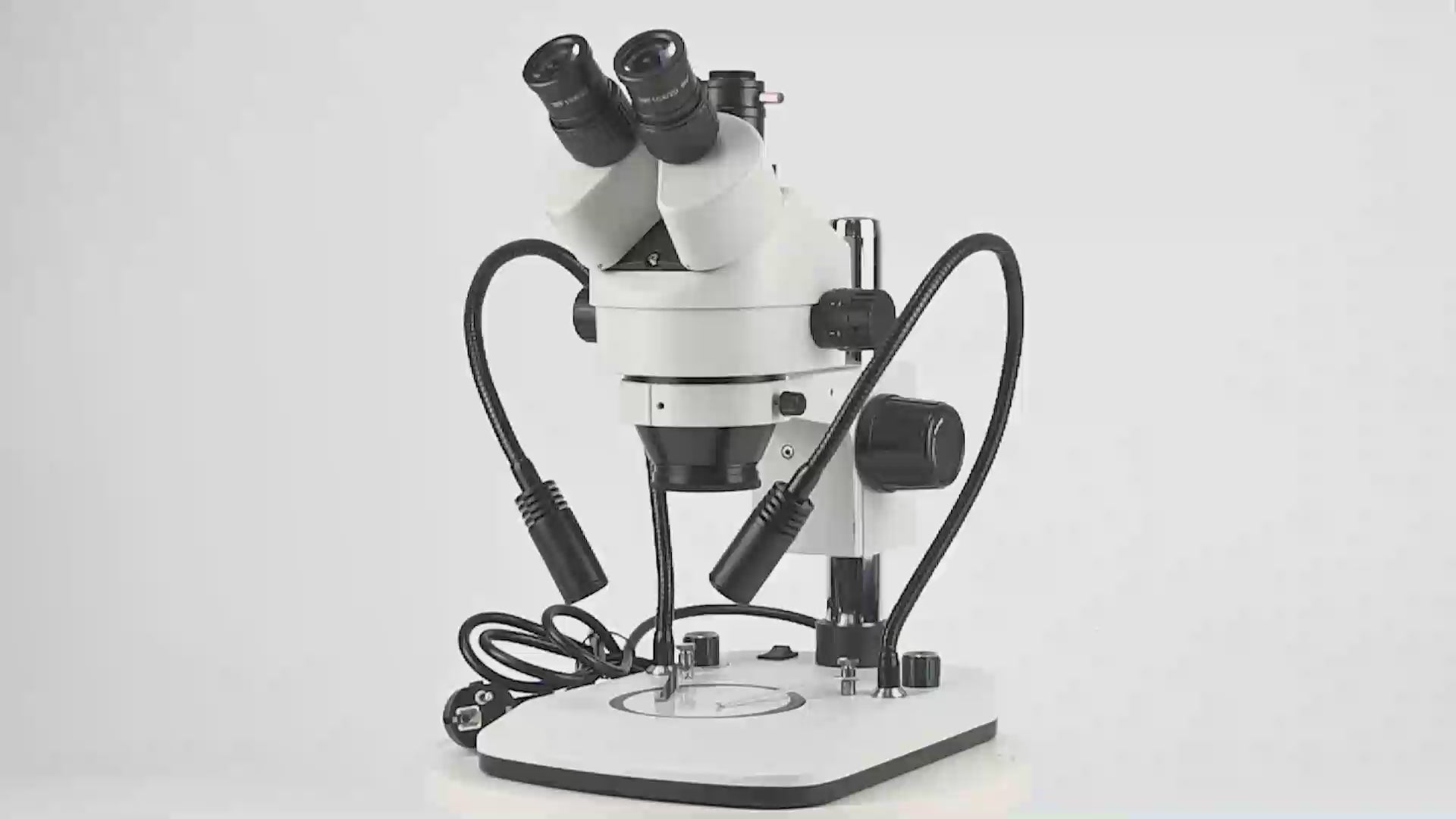 ZM0745T-D9 Стереомикроскоп с увеличением 0,7X-4,5X и источником света на двух гибких стойках ZM0745T-D9 Стереомикроскоп с увеличением 0,7X-4,5X и источником света на двух гибких стойках