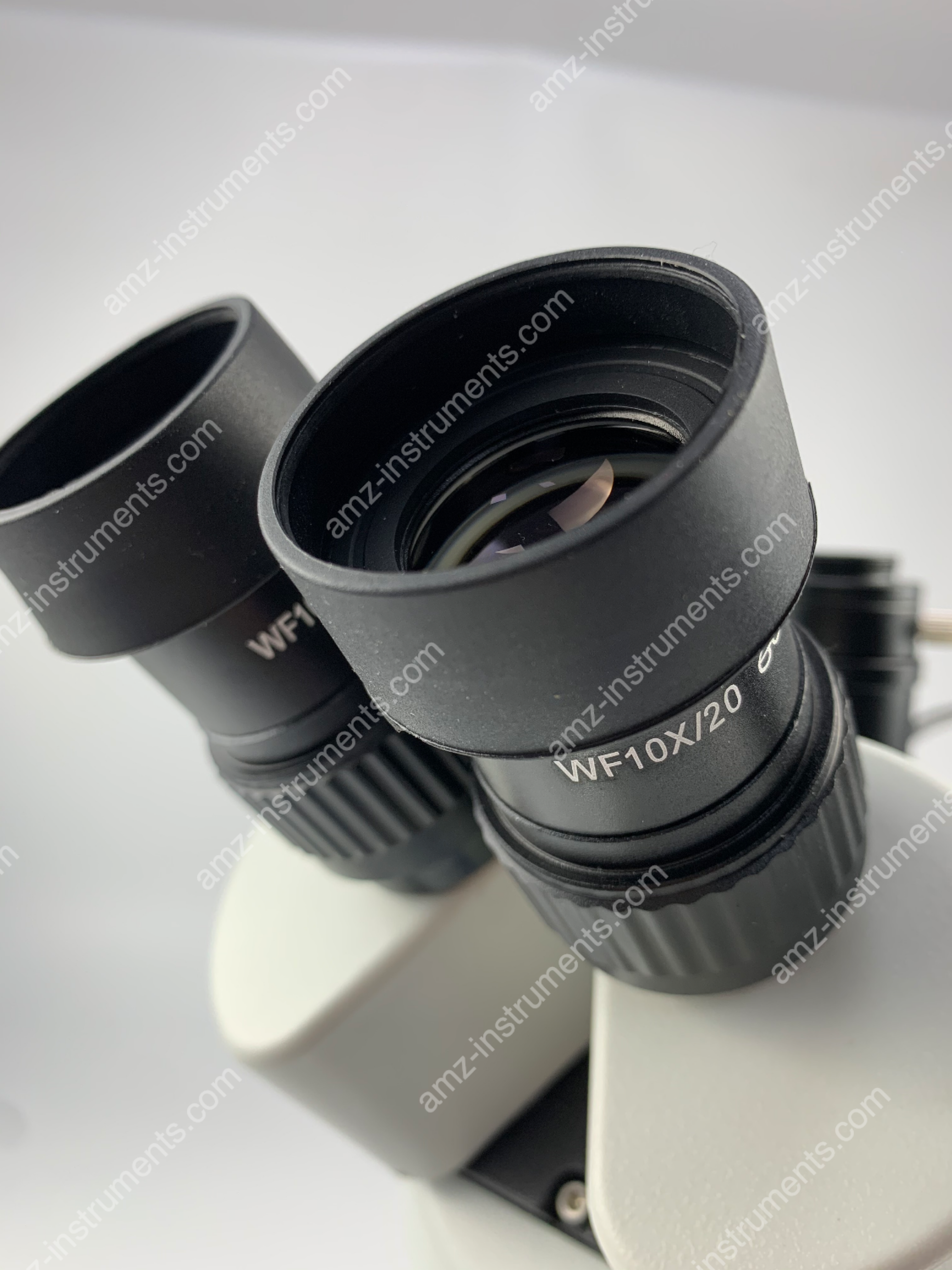 Тринокулярный стереомикроскоп ZM-2TD2 с увеличением 0,7X-4,5X Тринокулярный стереомикроскоп ZM-2TD2 с увеличением 0,7X-4,5X