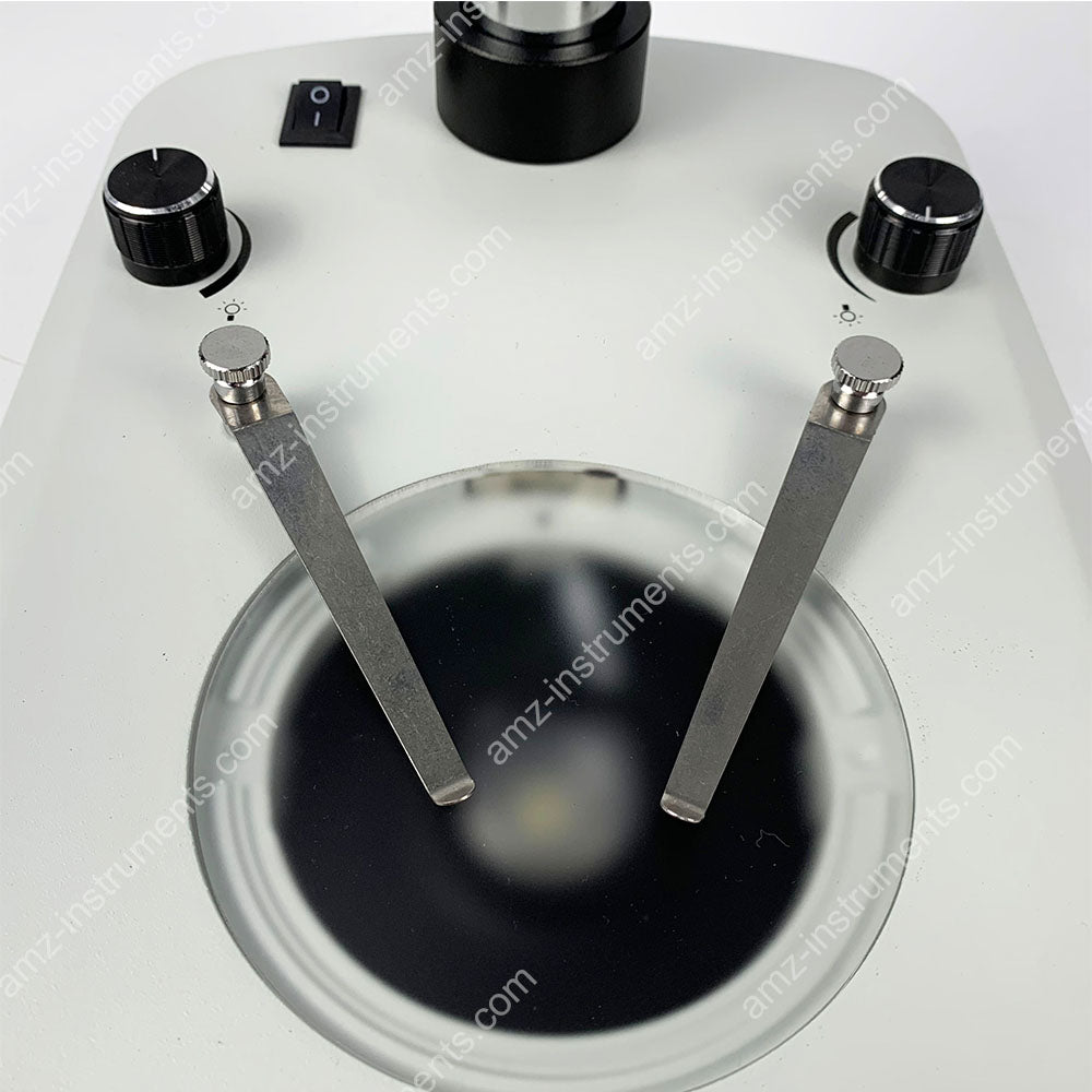 Тринокулярный стереомикроскоп ZM-2TD5L с увеличением 0,7X-4,5X Тринокулярный стереомикроскоп ZM-2TD5L с увеличением 0,7X-4,5X